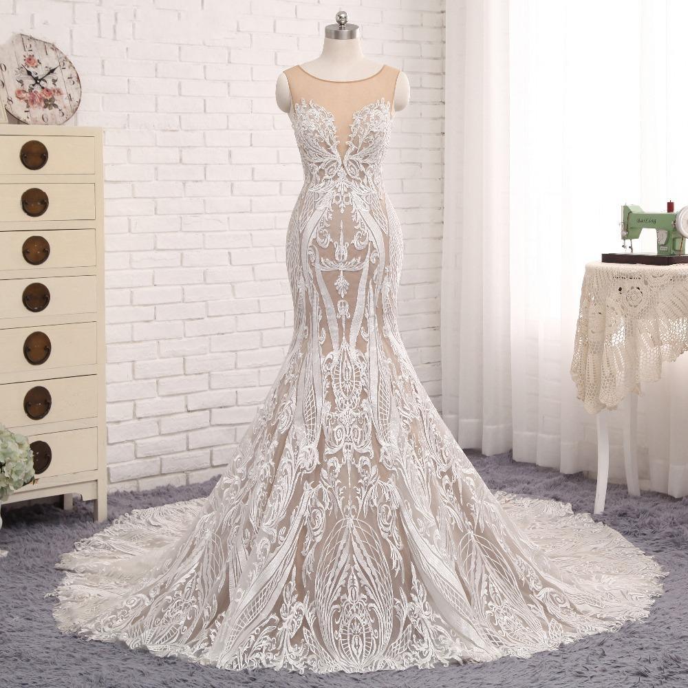 Sleeveless Sheer Luxury Lace Mermaid Wedding Dress Featuring Sheer Back And Long Train